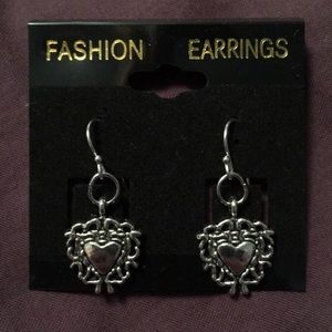 Heart earrings with detailed trim.